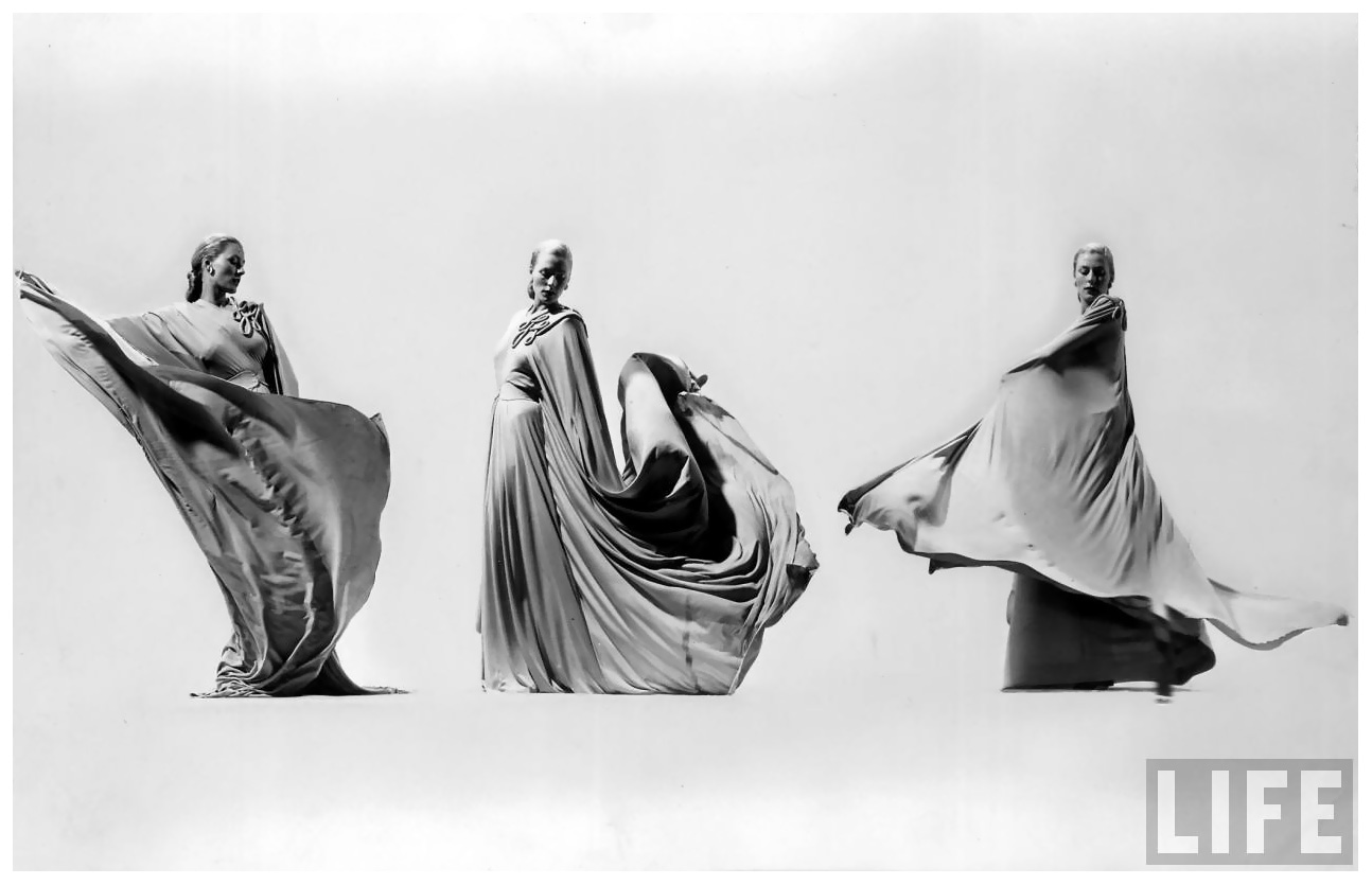 https://www.takefoto.ru/userfiles/image/Dlya%20Statey/07.12.2012/gjon_mili/riple-image-of-model-demonstrating-swirling-motion-of-jersey-hostess-gown-designed-by-adrian-1947-gjon-mili.jpeg